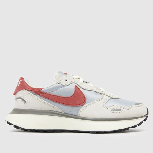 Nike phoenix waffle trainers in white & orange