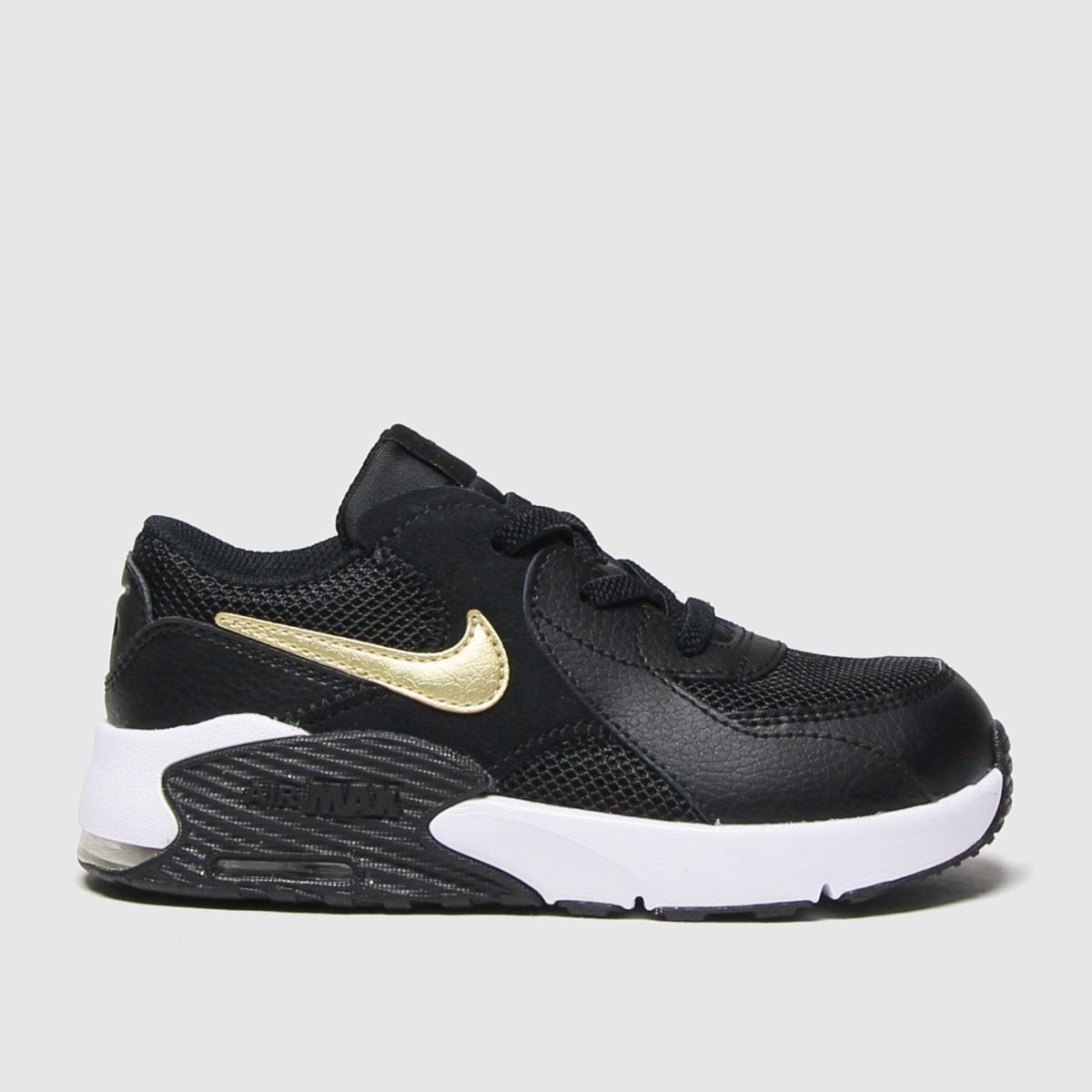 Gold and store black nike trainers