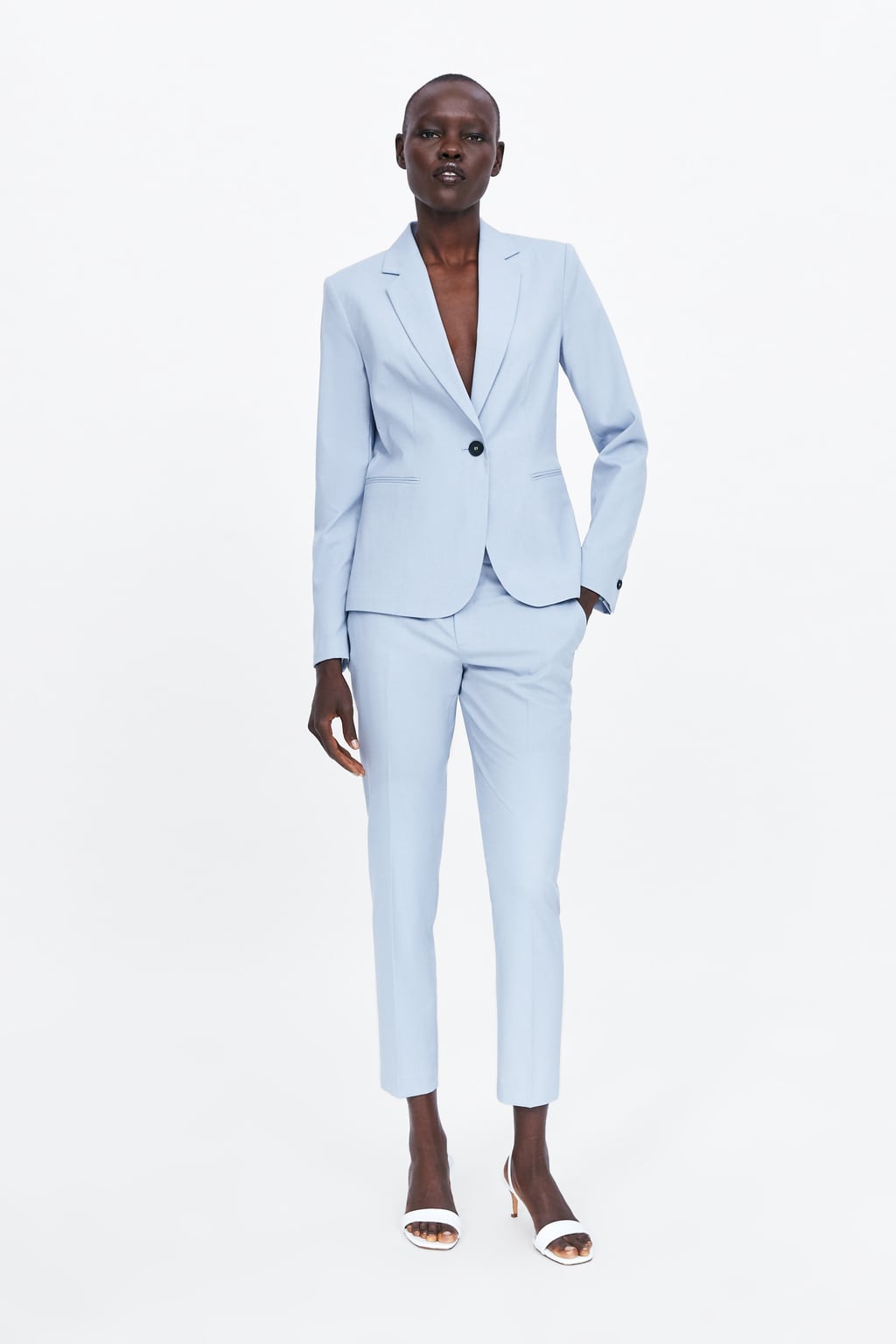 style in a blue Zara suit 
