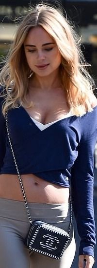 Copy Kimberley Garner in a blue wrap crop top by Alo Yoga | MailOnline