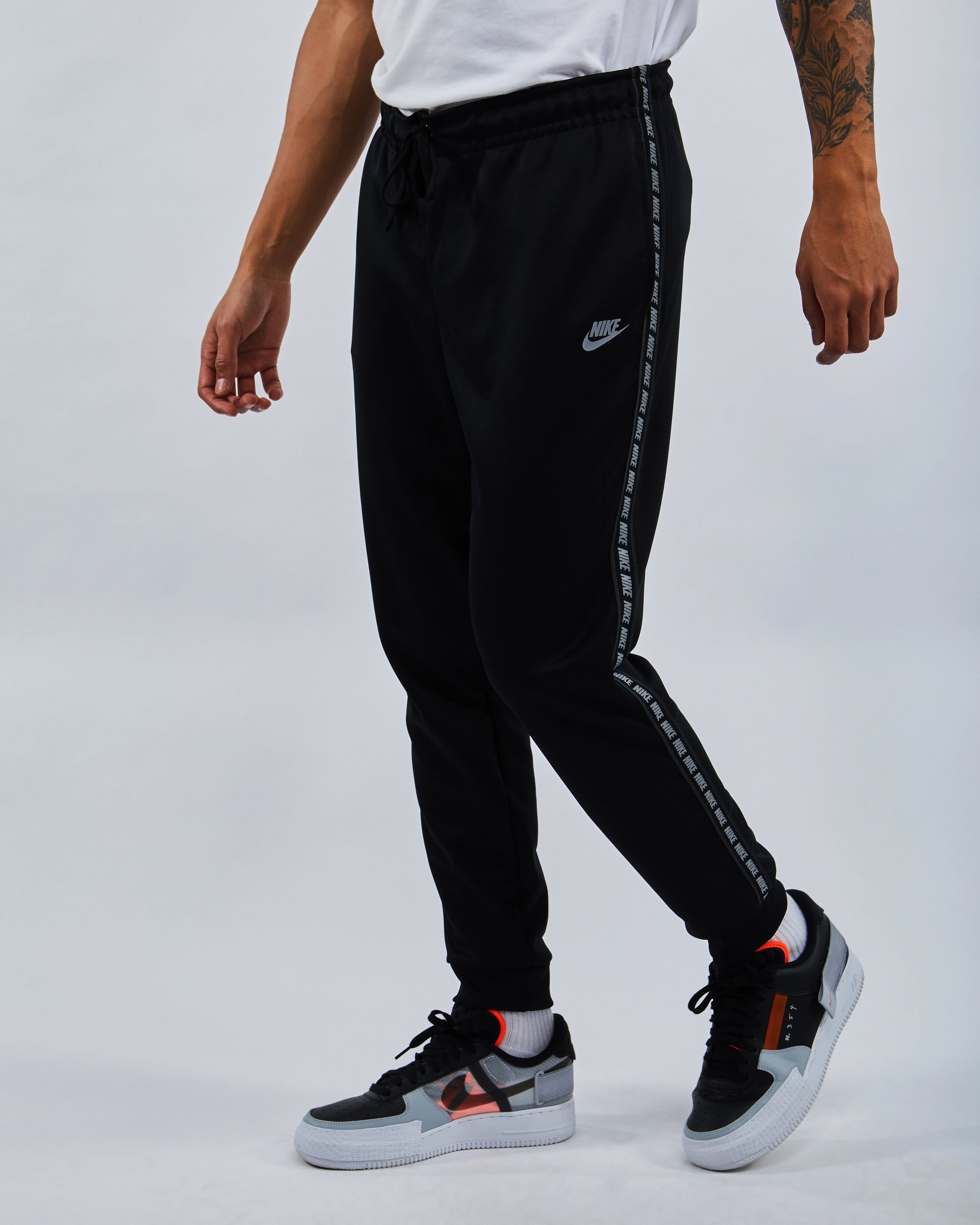 nike reflective swoosh poly pant