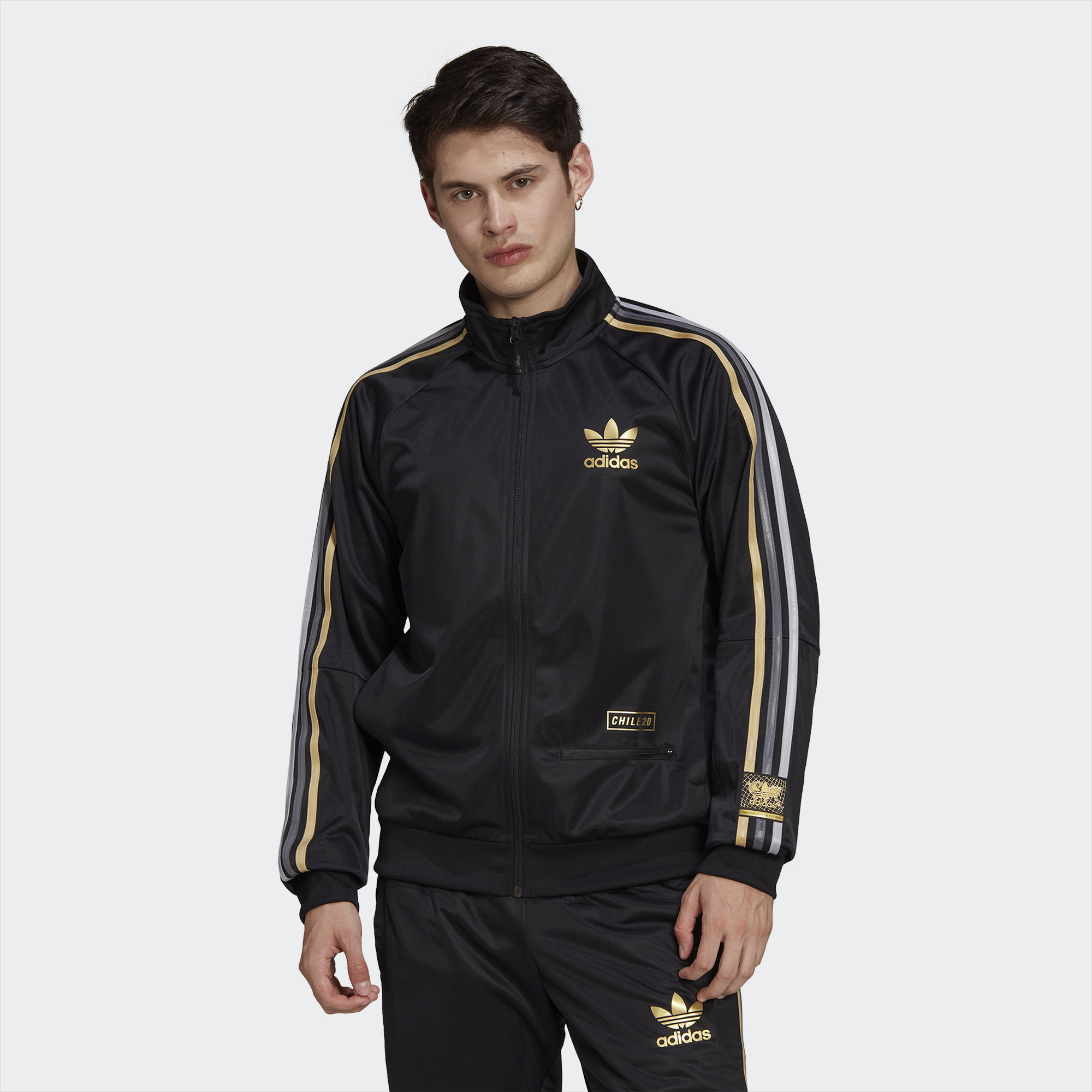 Adidas superstar black clearance and gold track top