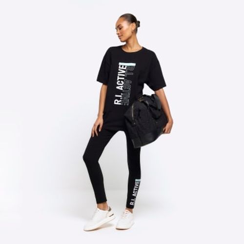 https://ik.imagekit.io/sqhmihmlh/https:/images.riverisland.com/is/image/RiverIsland/black-ri-active-leggings_758496_main?%24ProductImagePortraitLarge%24=&ik-sdk-version=javascript-1.3.6&tr=c-limit%2Cw-500%2Ch-%2Cdefault+image-https%3A%2F%2Fik.imagekit.io%2Fsqhmihmlh%2Fmissing_image.jpg