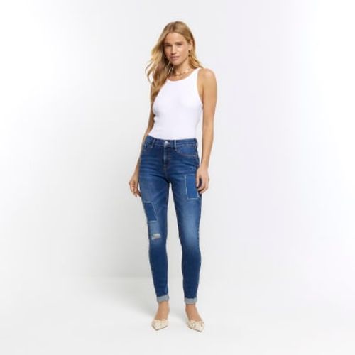 River Island Molly mid rise bum sculpt skinny jeans in black