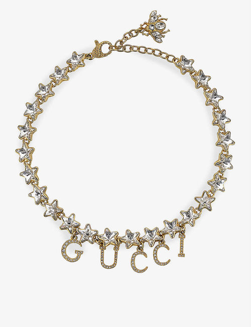 Gucciscript brass and crystal...