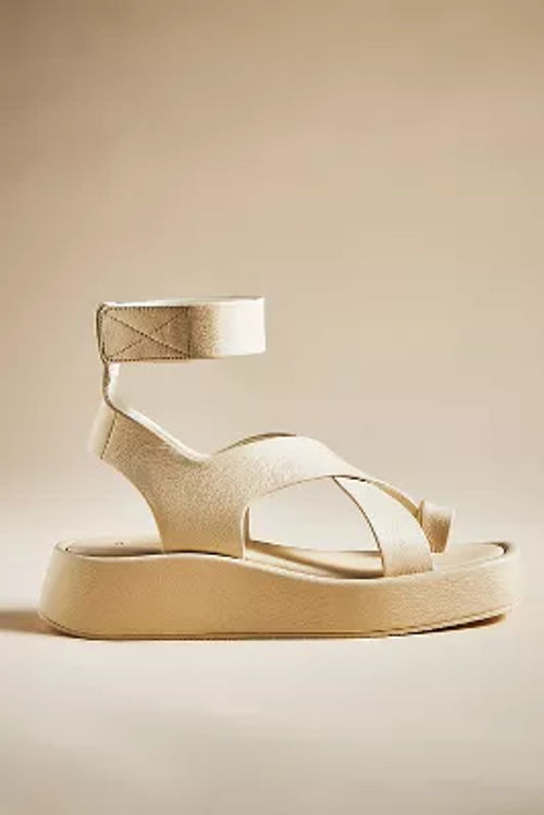 By Anthropologie Toe-Loop...