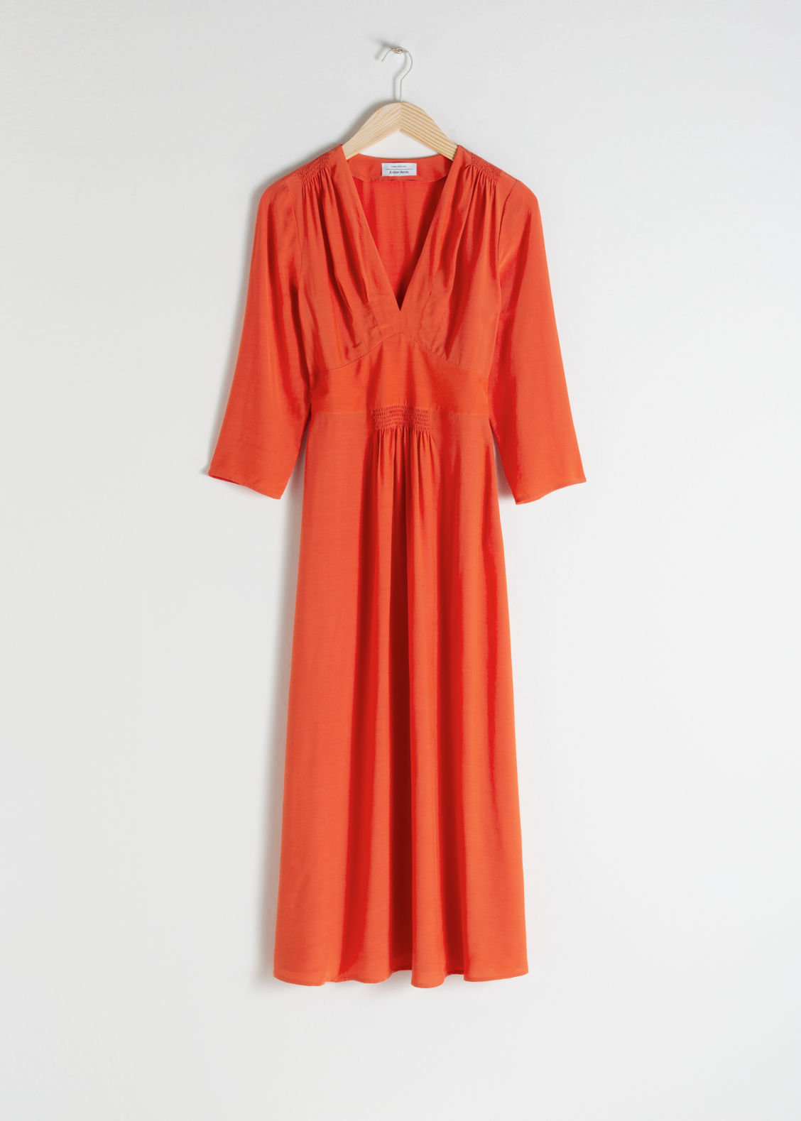 orange long sleeve midi dress