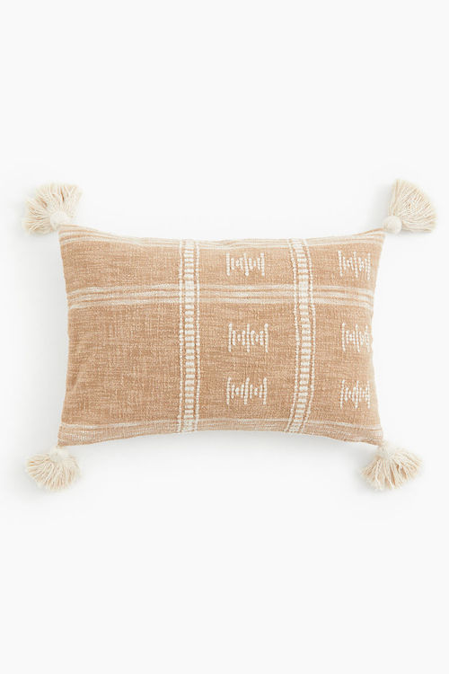 H & M - Tasselled cushion...