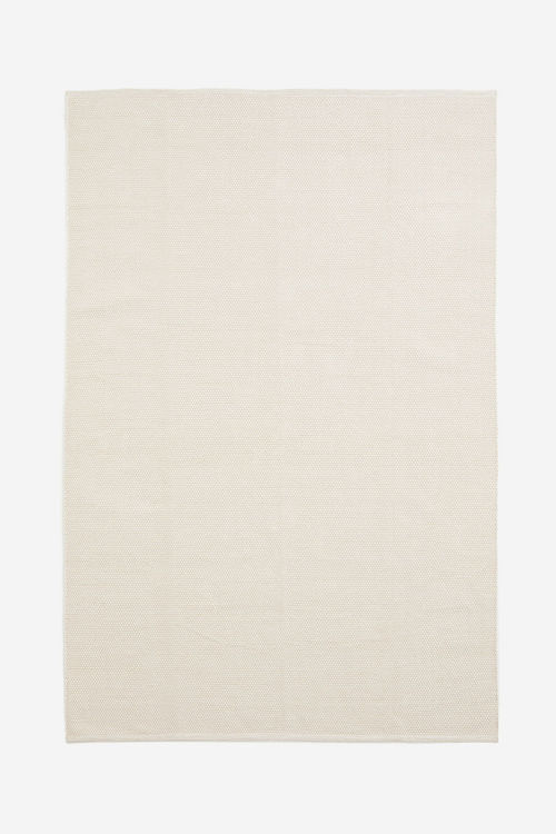 H & M - Textured cotton rug -...