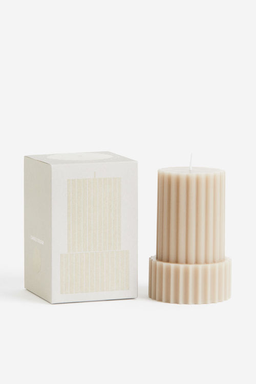 H & M - Shaped pillar candle...