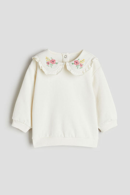 H & M - Embroidered-motif top...