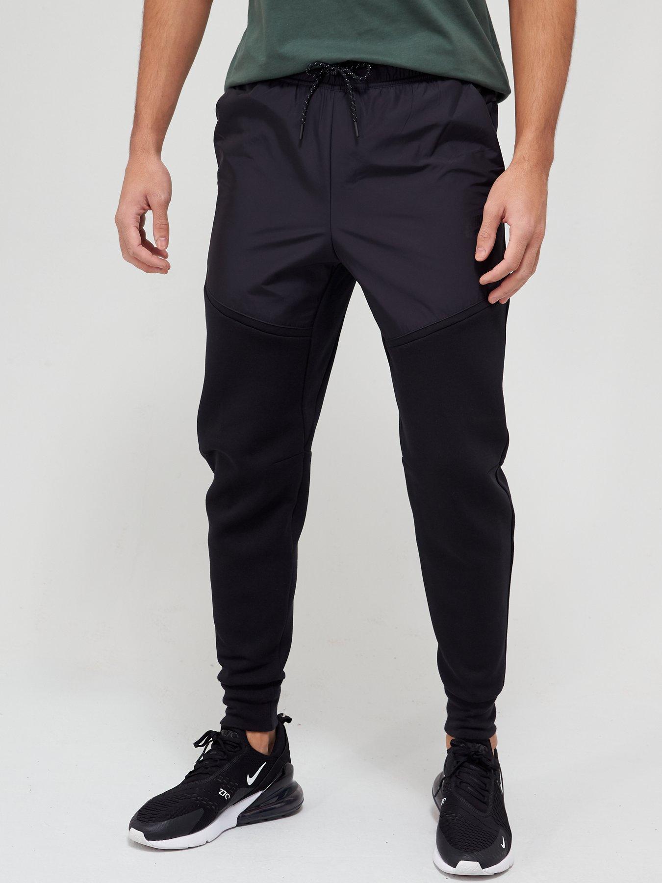 Nike Tech Fleece/Nylon Mix Pants - Black | Compare | Grazia