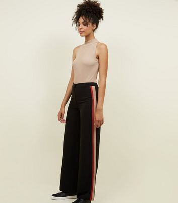 Sacai sidestripe straightleg Trousers  Farfetch