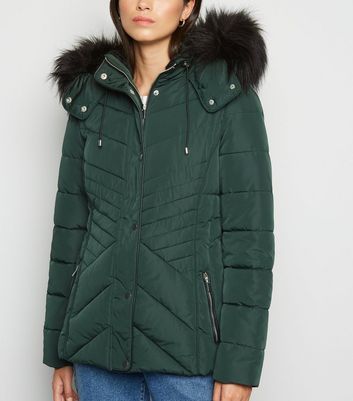 dark green puffer coat