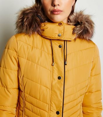 mustard faux fur trim hooded puffer coat