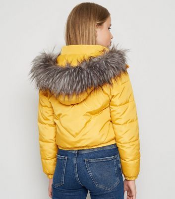 mustard puffer jacket with fur hood