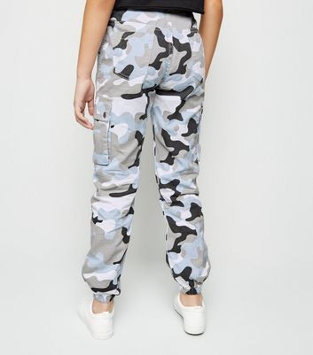 New look camouflage trousers with pockets on the  Depop