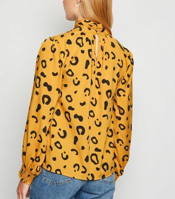 yellow leopard print top
