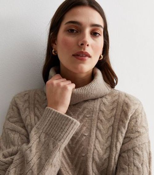 Mink Cable Knit Roll Neck...
