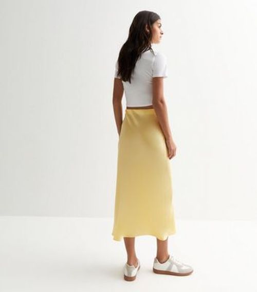 Pale Yellow Satin Midi Skirt...