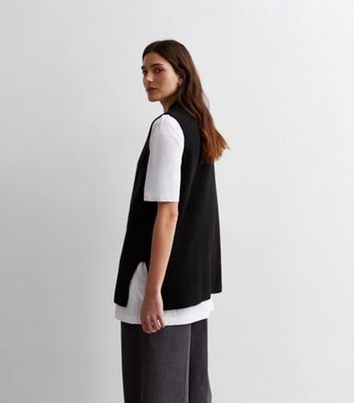 Black Soft Knit V Neck Vest...