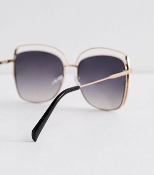 Gold Curved Frame Sunglasses...