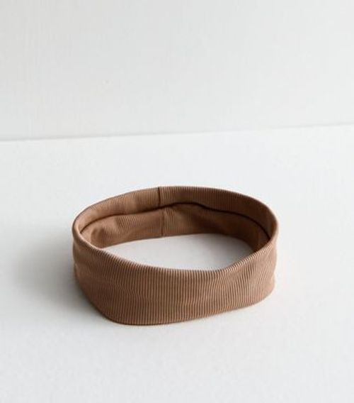 Rust Ribbed Stretch Headband...