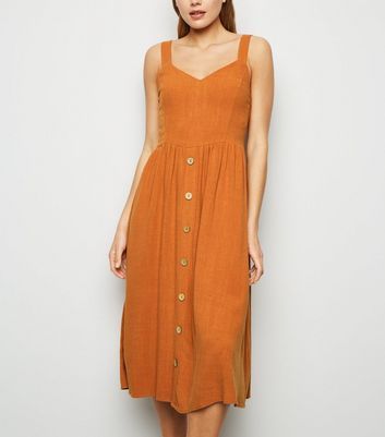 rust button dress