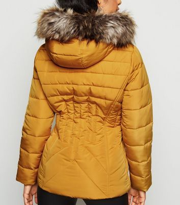 mustard puffer coat