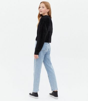 black fluffy jumper