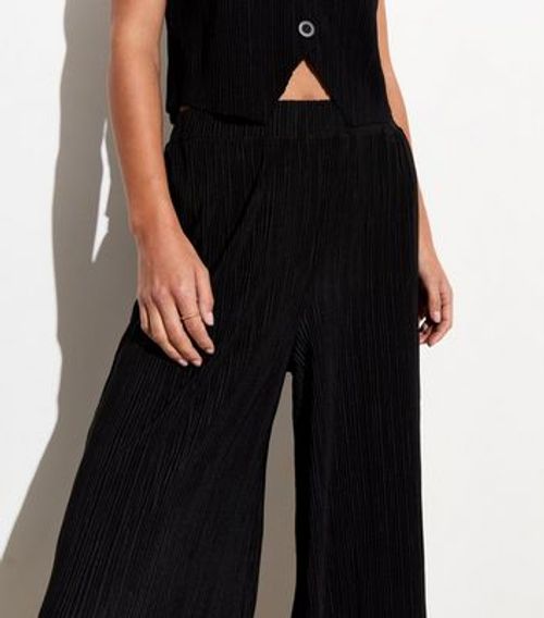 Black Plisse Pleated Trousers...