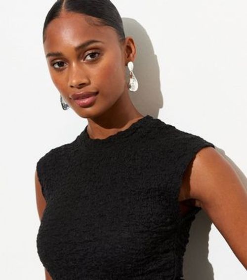 Black Textured Sleeveless Top...