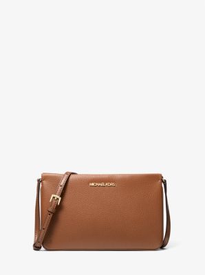 Michael kors tan wristlet hot sale