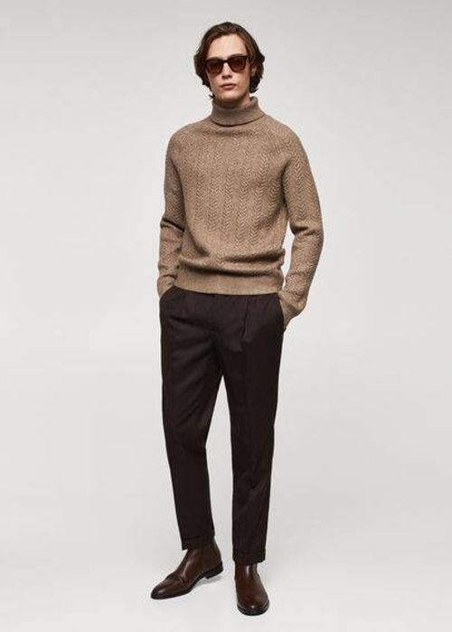 Twisted turtleneck sweater...