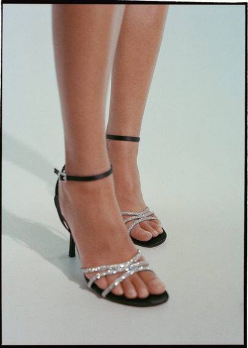 Heeled sandals with...