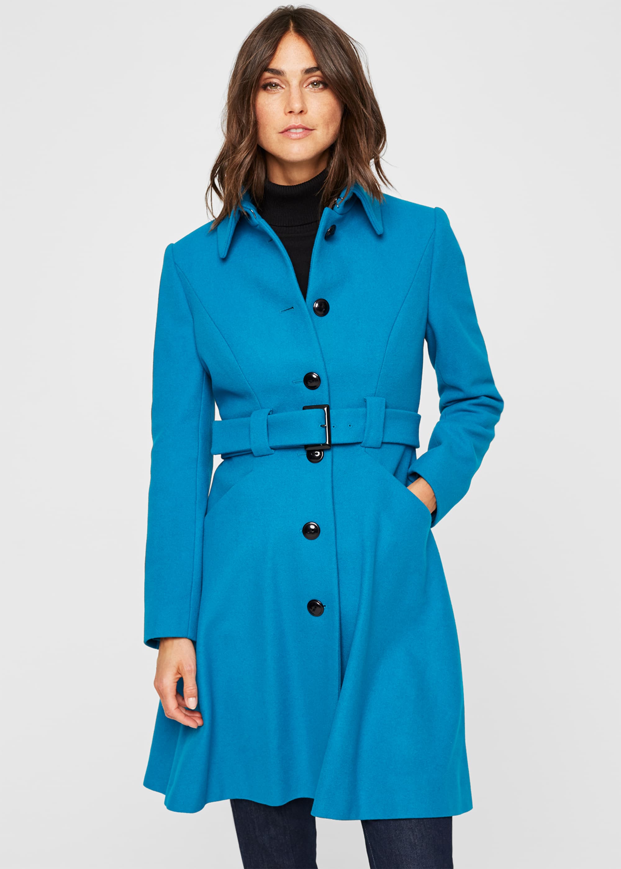 Damsel in a shop dress coat