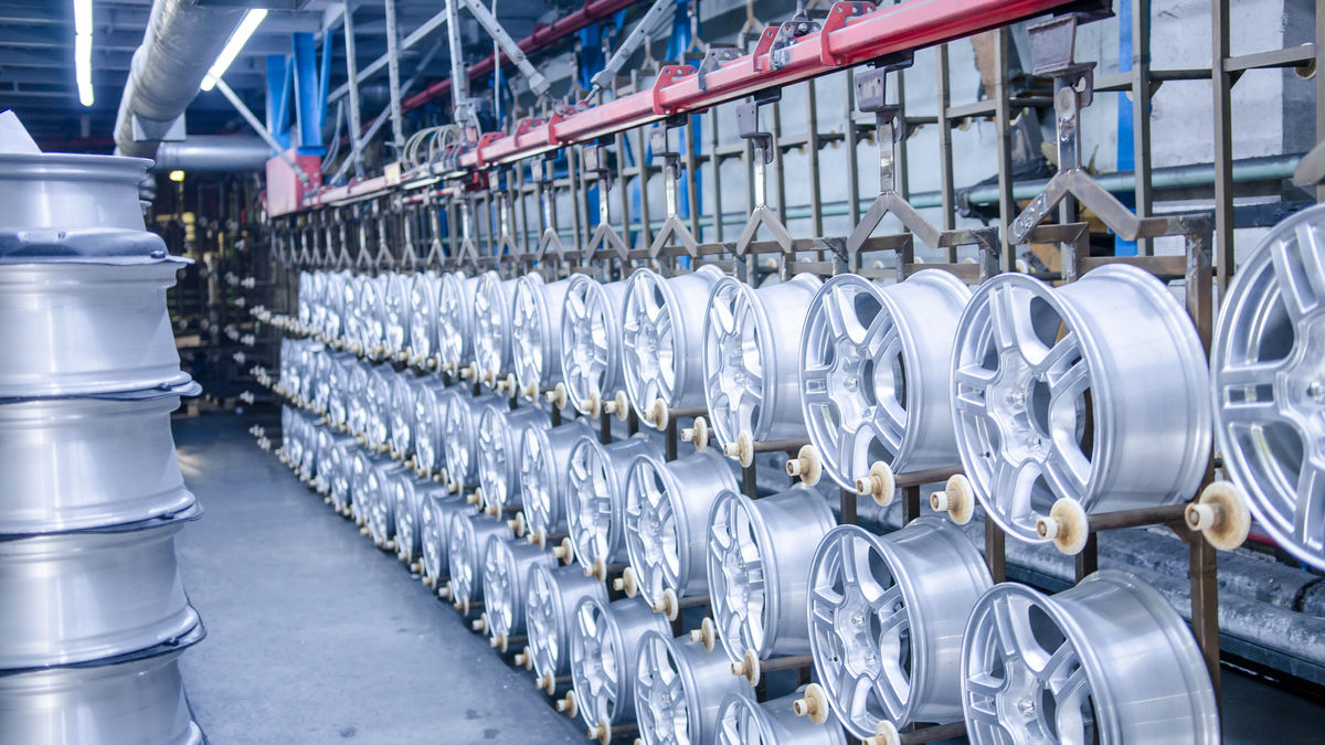 Interior of a foundry - workstation and equipment for the production alloy wheels. Industrial zone