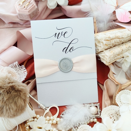 Invitation 2103: Silver Ore, Silver Wax, Deep Blush Ribbon - This is a vertical opening pocket folder on silver ore with a deep blush ribbon and silver wax seal design.