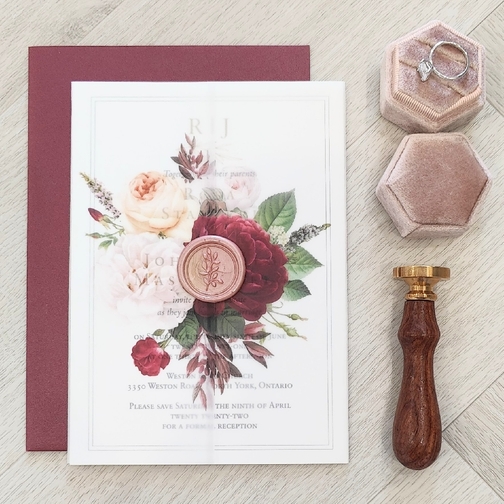 Simple single card wedding invite with an elegant vellum wrap and wax seal touch.
