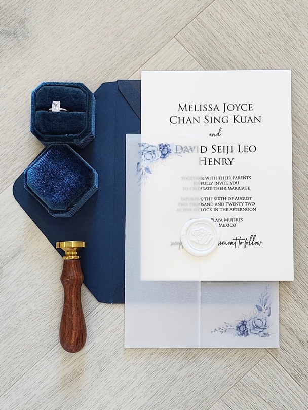 Letterpress Wedding Card with a full wrap vellum enclosure and wax seal