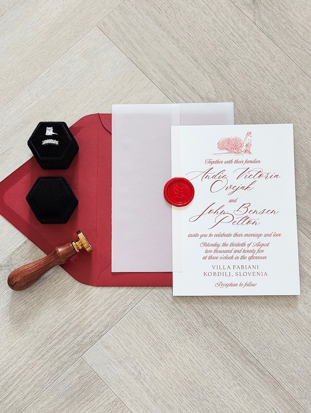 Letterpress Wedding Invitation with a red ink and vellum wrap and red wax seal