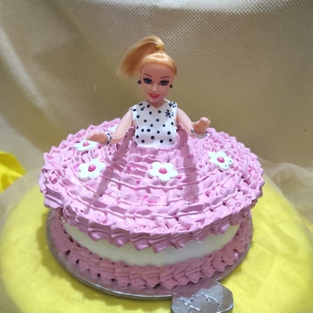 Barbie doll themed cake