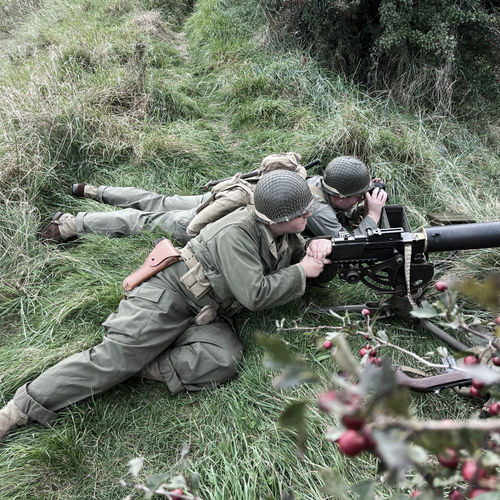 Unexpected German resistance from local units is encountered, and so the MG team lay down suppressing fire.