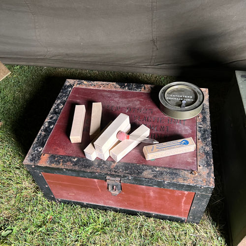 Close-up showing an original WWII Venereal Prophylactic Unit. The kit included all of the required equipment for treating mild venereal diseases.