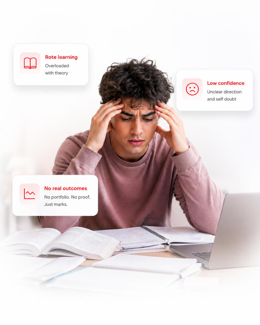 Teenager stressed at a desk, head in hands, books and calculator spread out