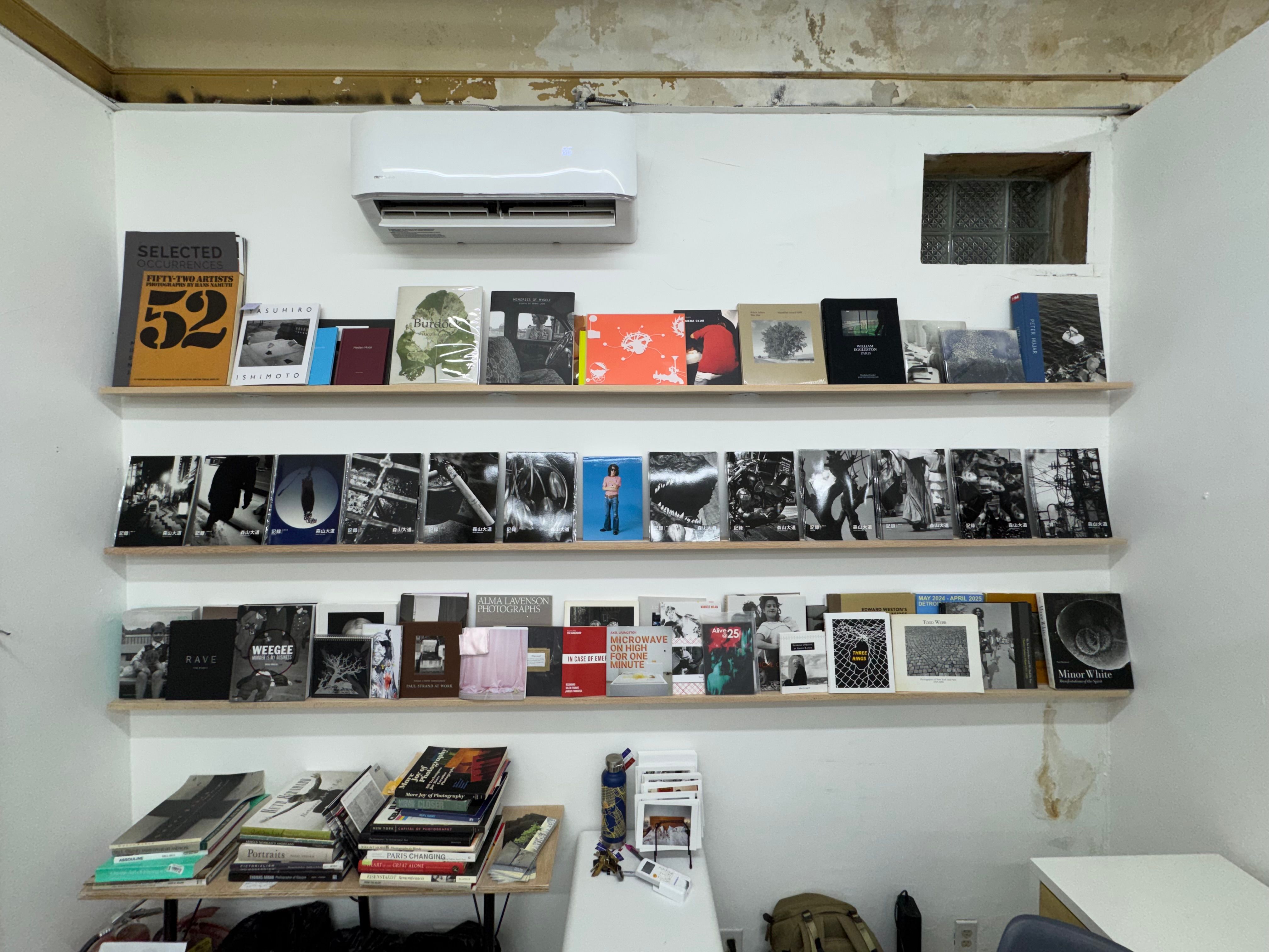Photobook wall at The Barbershop