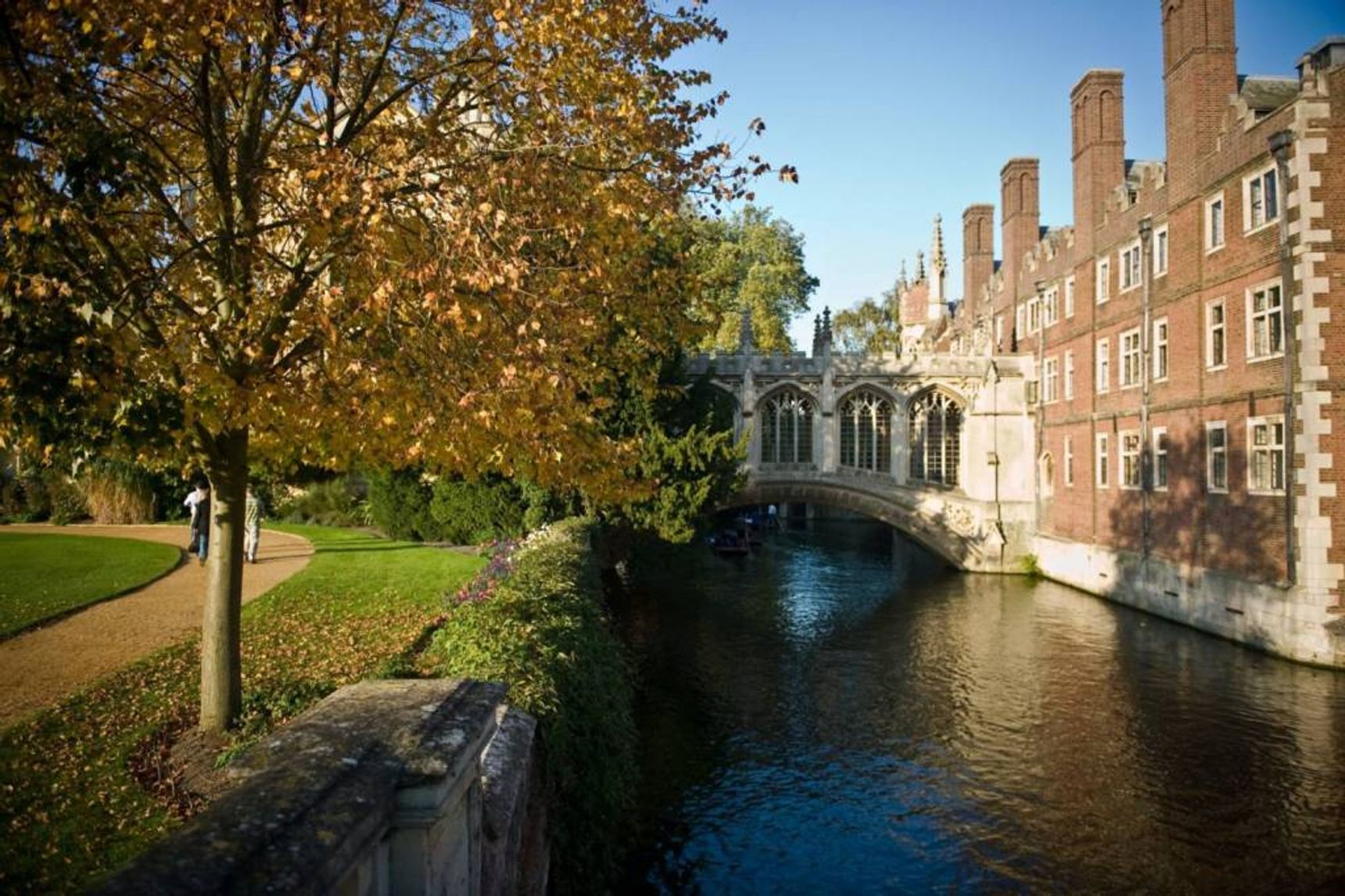 lake beside building during daytime