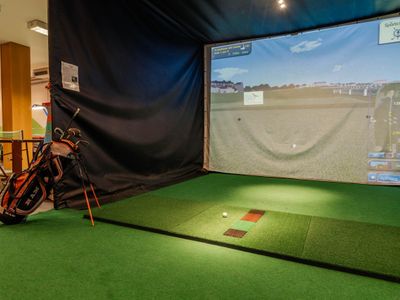 Campo pratica di golf al coperto