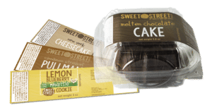 Individual Cake Slice in to-go container with repack labels. 