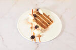 View Four High Carrot Cake & Thai Tea Reduction